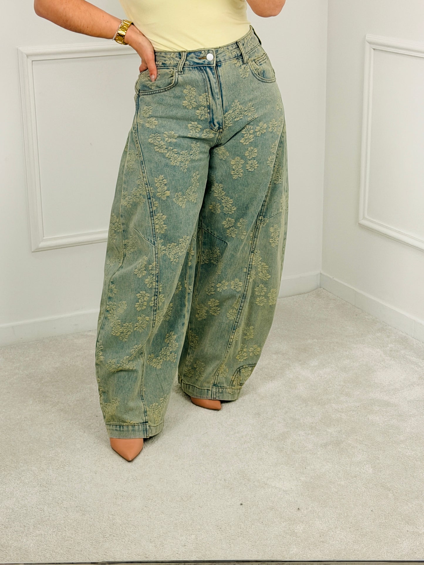 CALÇA DE GANGA FLORAL EFEITO VINTAGE