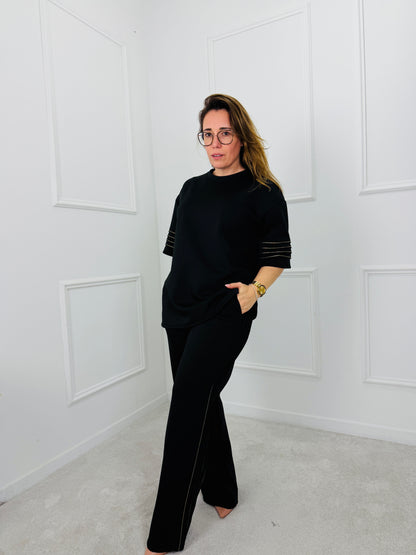 CONJUNTO PRETO COM DETALHE DOURADO