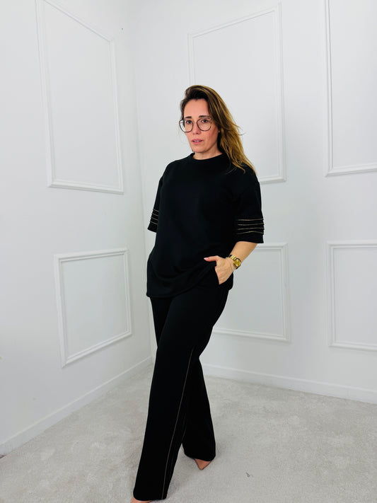 CONJUNTO PRETO COM DETALHE DOURADO