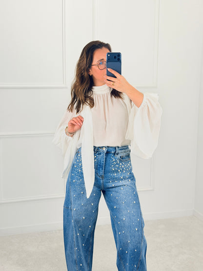 BLUSA FLUIDA COM MANGAS VOLUMOSAS